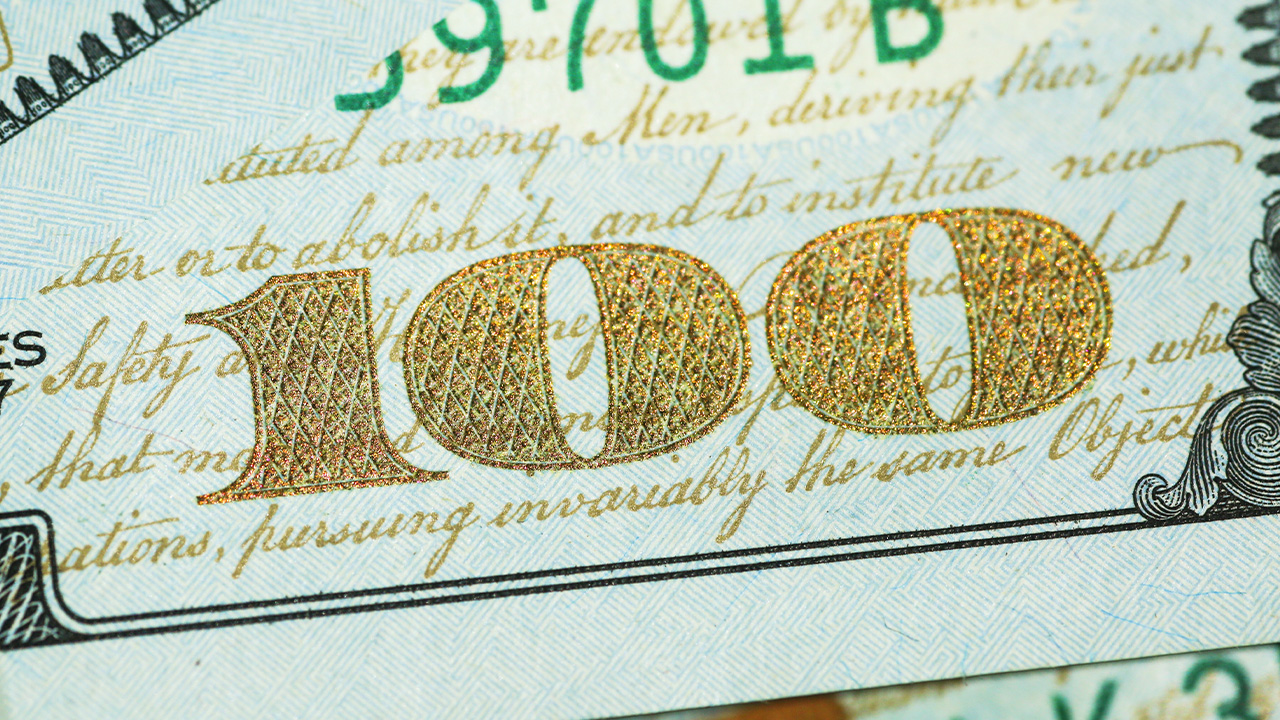 One hundred dollar bill close up photo